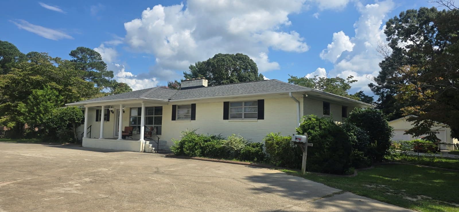 Gallery photos for Brick Home Transformation with New Shingle Roof: Image #1